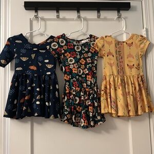 (3) bundle Dot Dot Smile dress Size 12/24 Month. Condition - very good